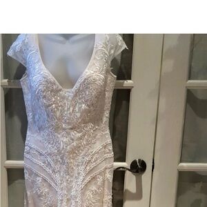 Xscape embroidered dress.